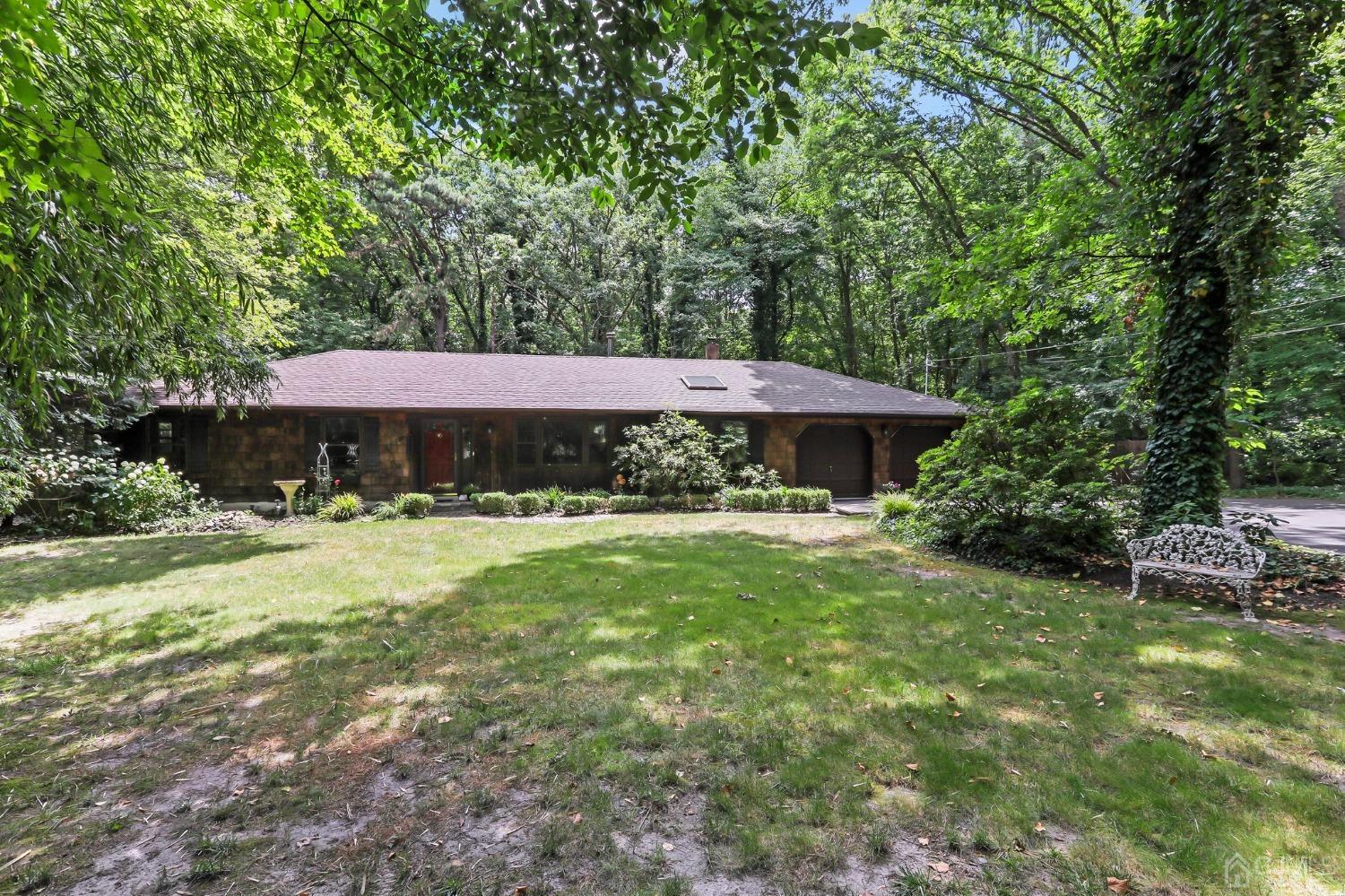 111 Old Forge Road Monroe Township, NJ 08831 - Photo 24 of 39 a front view of a house with yard and trees