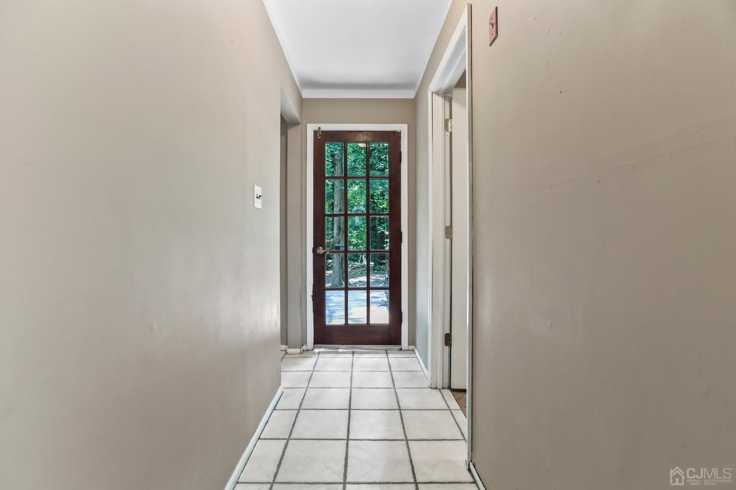 111 Old Forge Road Monroe Township, NJ 08831 - Photo 10 of 39 a view of an empty room with windows