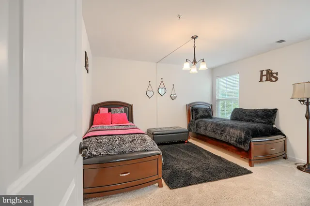 a front view of a house with a yard and porch