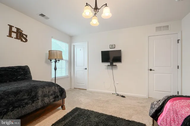 a house view with a backyard space