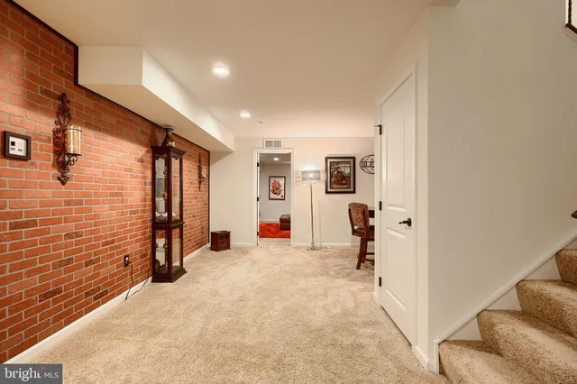 an aerial view of a house with outdoor space