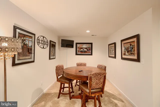 an aerial view of a house with a ocean view