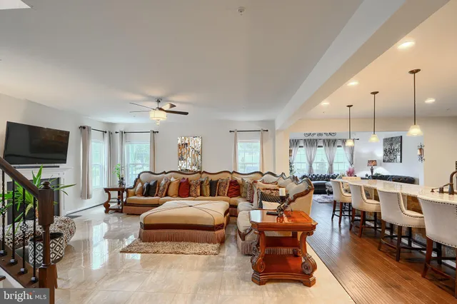 a kitchen with granite countertop stainless steel appliances and wooden cabinets