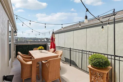 a view of a hallway with seating area