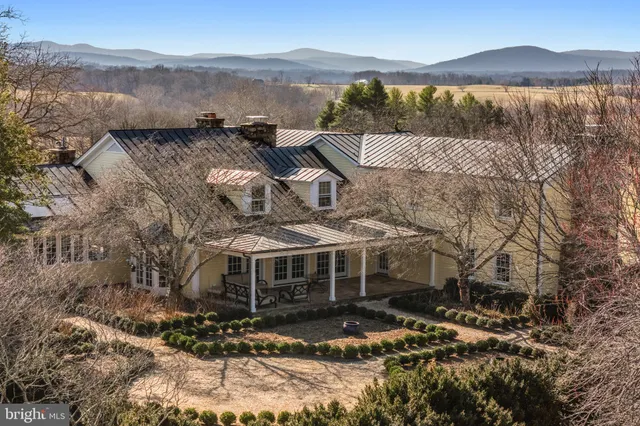 a room with a dresser and a chair