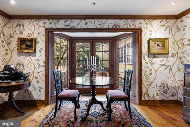a view of a patio with swimming pool table and chairs
