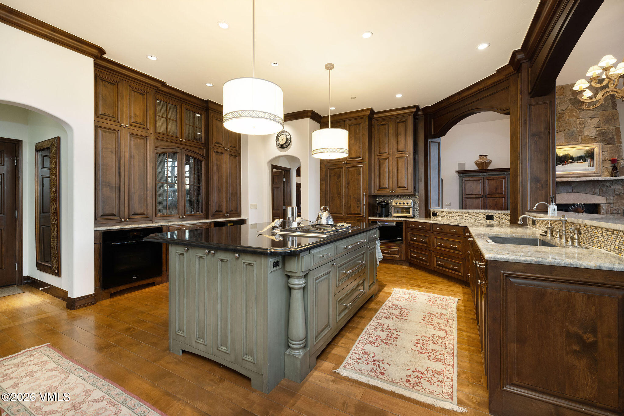 102 Saddle Ridge Loop Edwards, CO 81632 - Photo 7 of 29 a large kitchen with a stove and a sink
