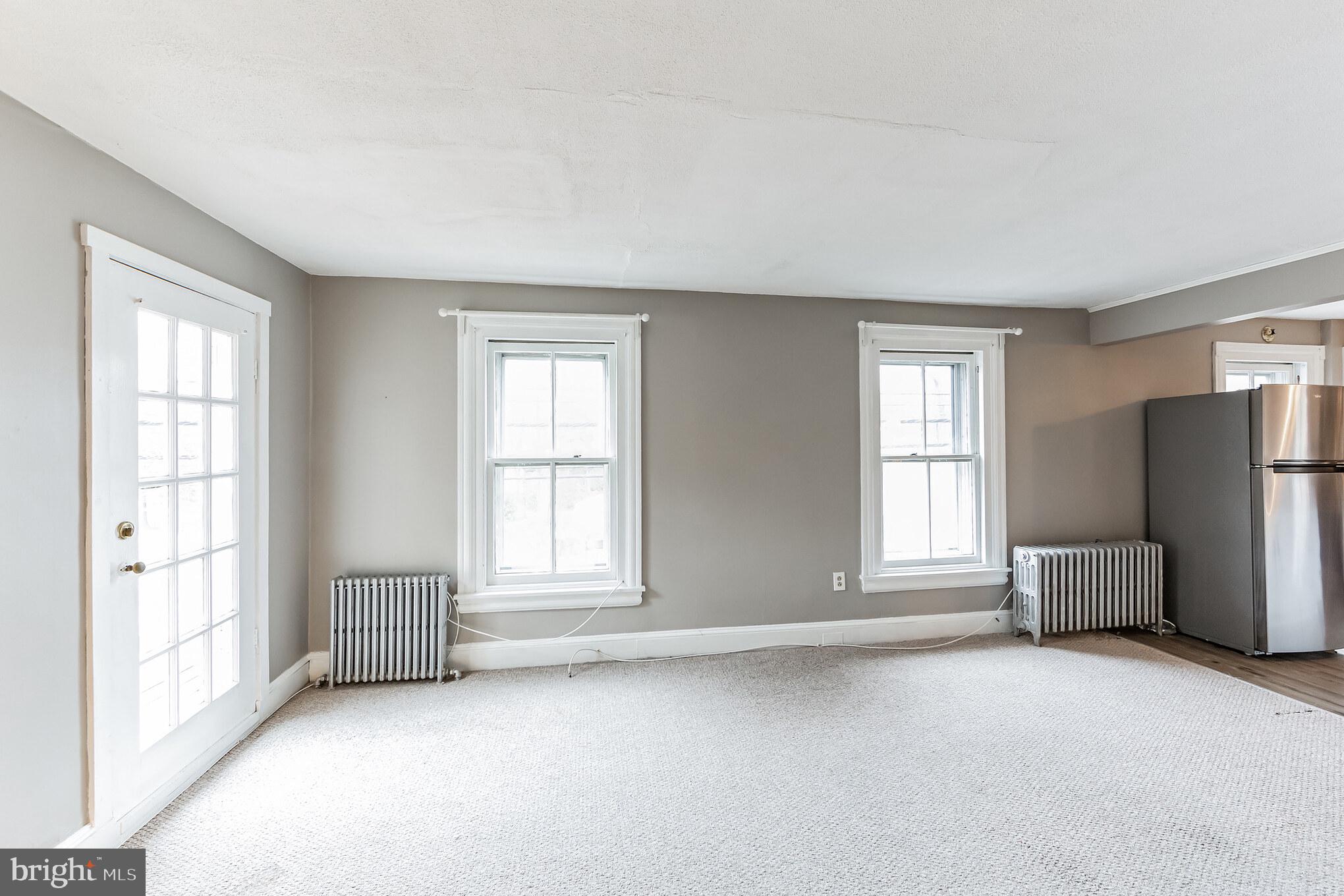 431 West Beechtree Lane Wayne, PA 19087 - Photo 10 of 33 Living Room with Access to the Porch