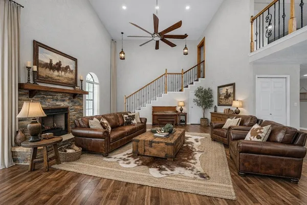 a living room with furniture or couch and a fireplace