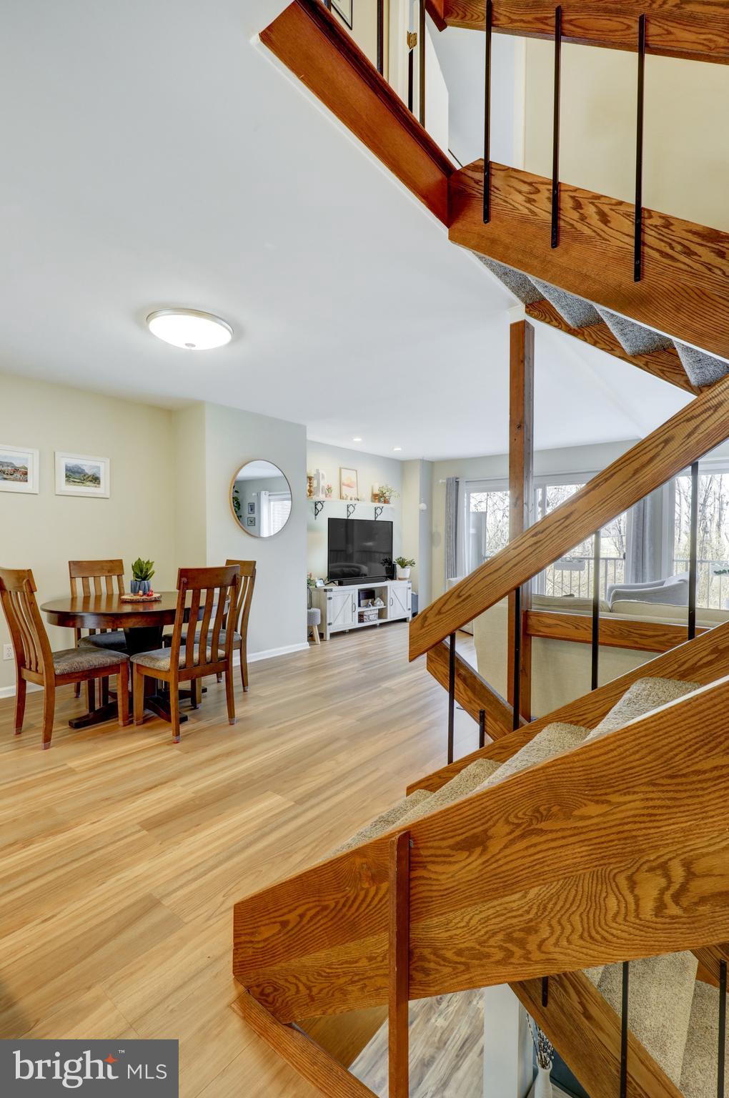 165 Oakmont Court Reading, PA 19607 - Photo 14 of 40 a view of dining room and kitchen with furniture and a window