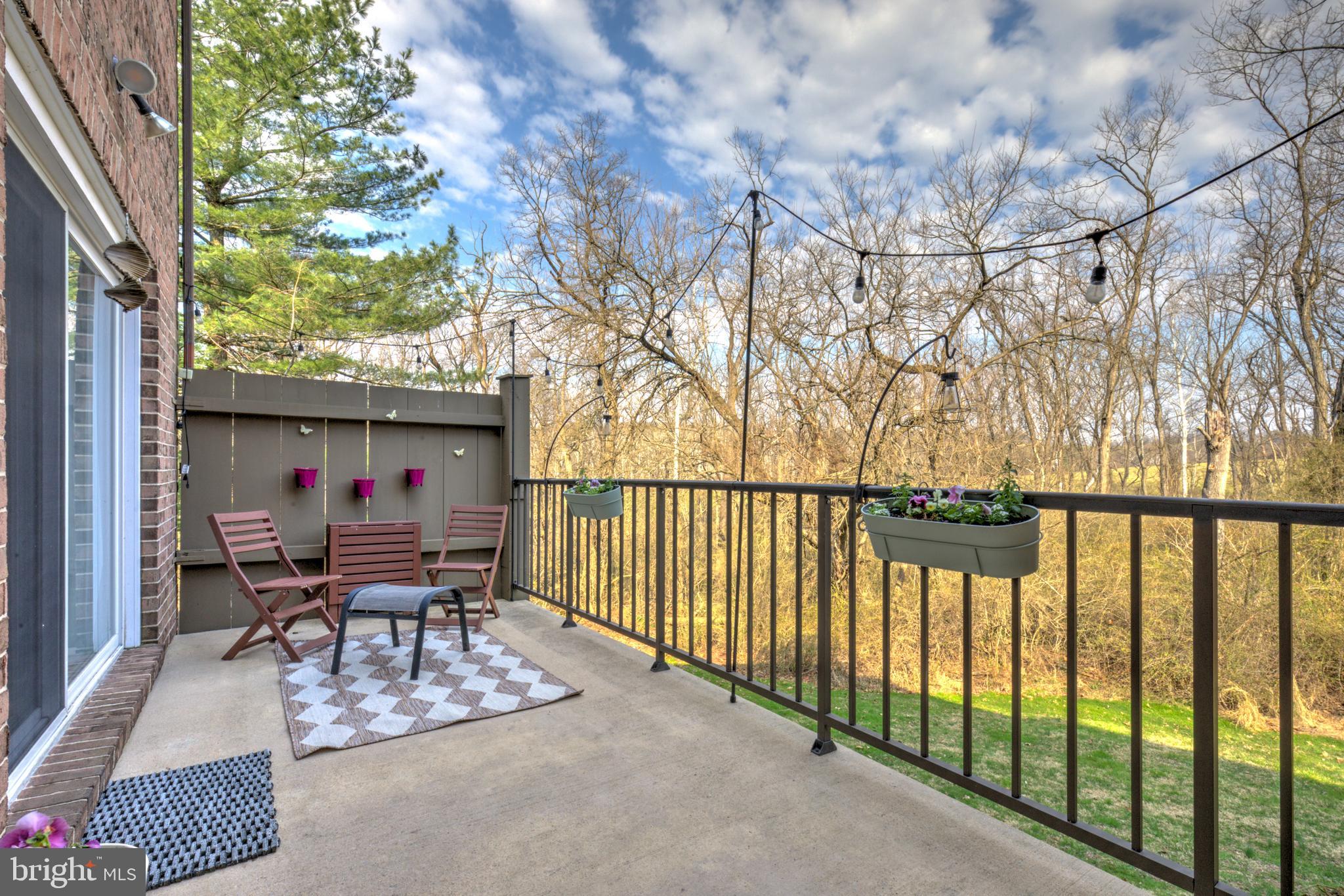165 Oakmont Court Reading, PA 19607 - Photo 20 of 40 a balcony with table and chairs