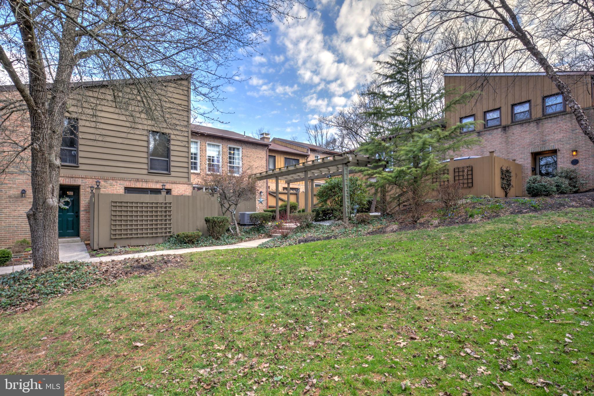 165 Oakmont Court Reading, PA 19607 - Photo 2 of 40 a view of a house with backyard and sitting area