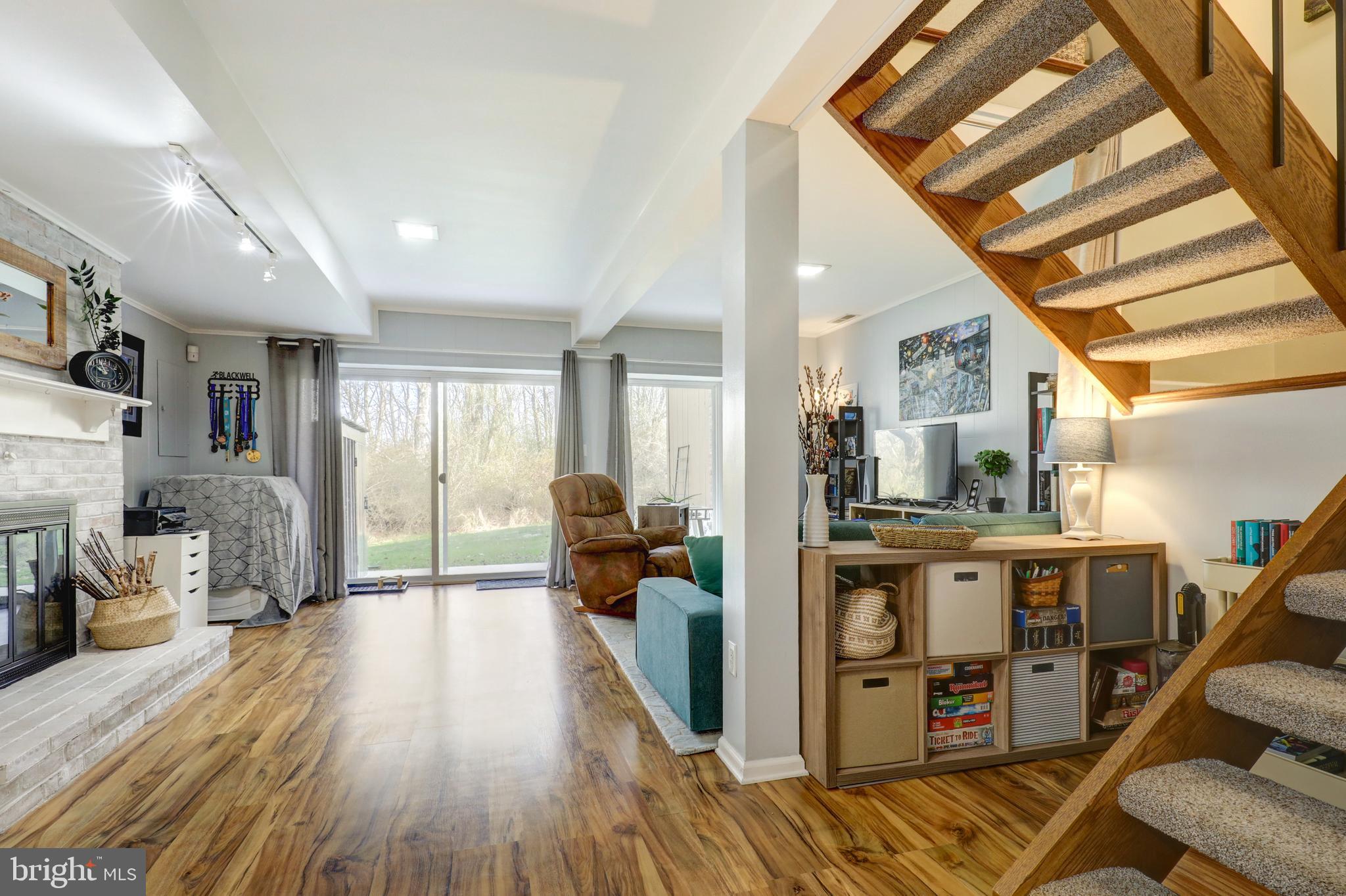 165 Oakmont Court Reading, PA 19607 - Photo 33 of 40 a living room with furniture and a wooden floor