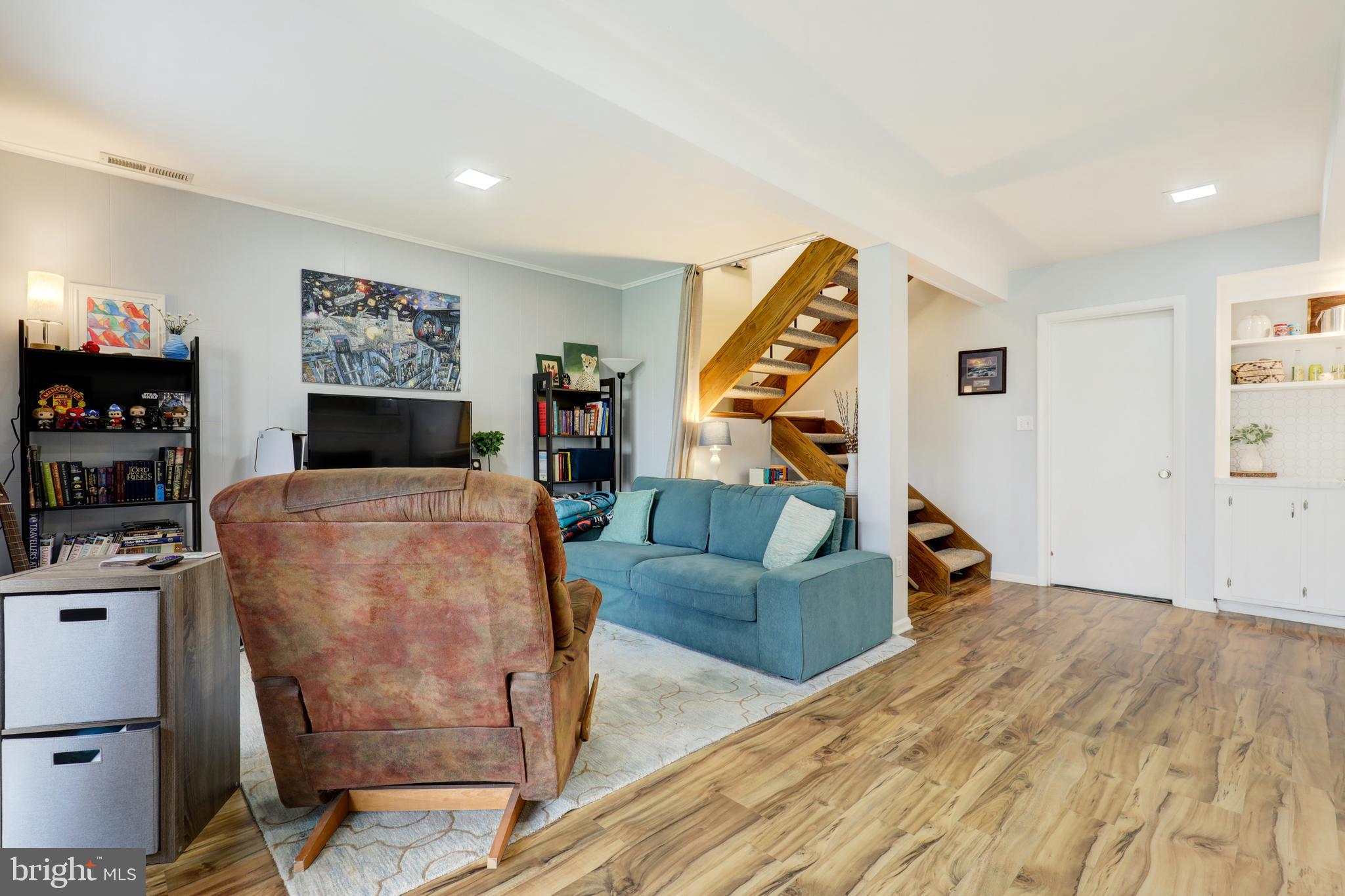 165 Oakmont Court Reading, PA 19607 - Photo 35 of 40 a living room with furniture and wooden floor