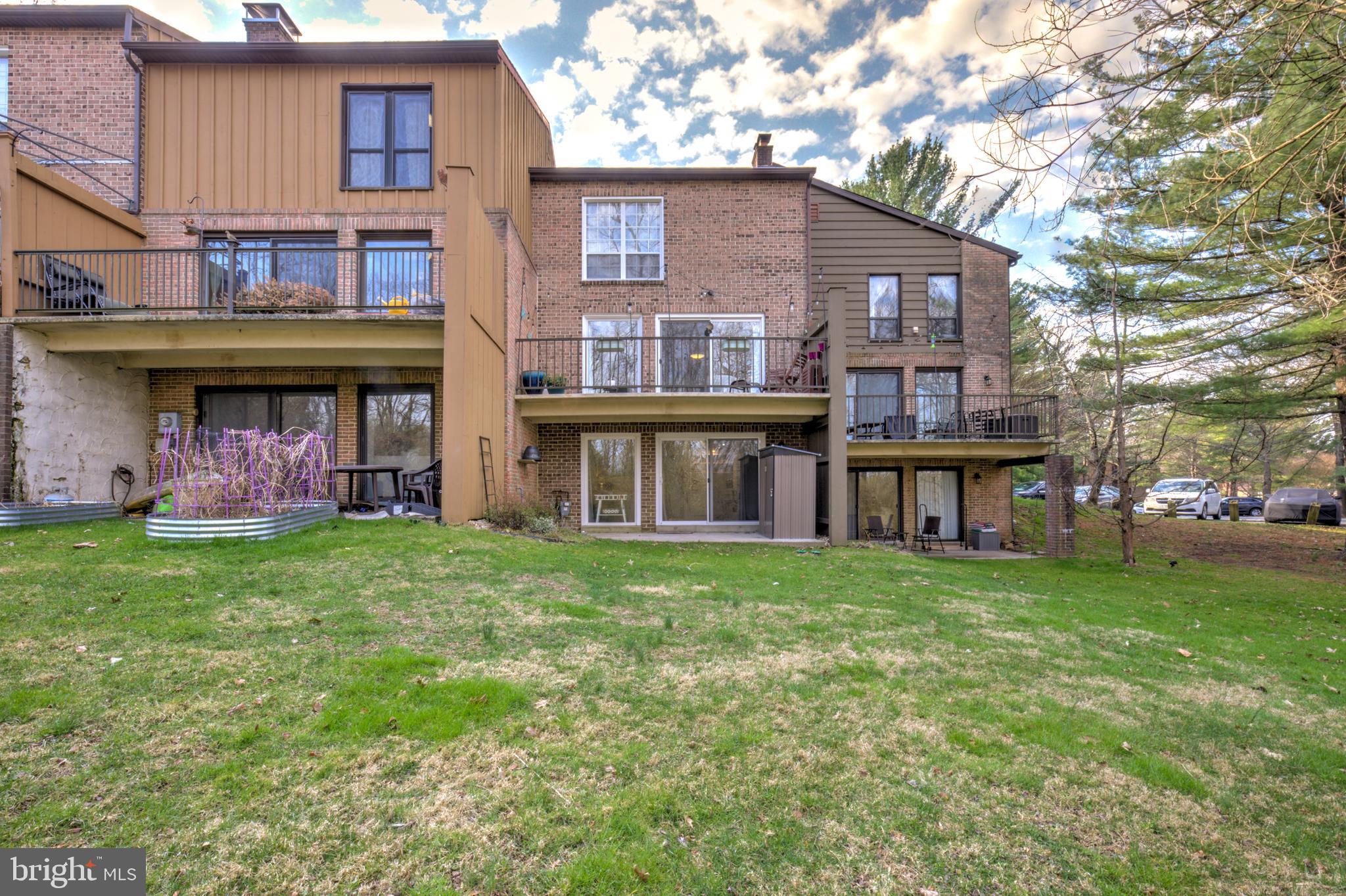 165 Oakmont Court Reading, PA 19607 - Photo 39 of 40 a view of a house with a yard and sitting area