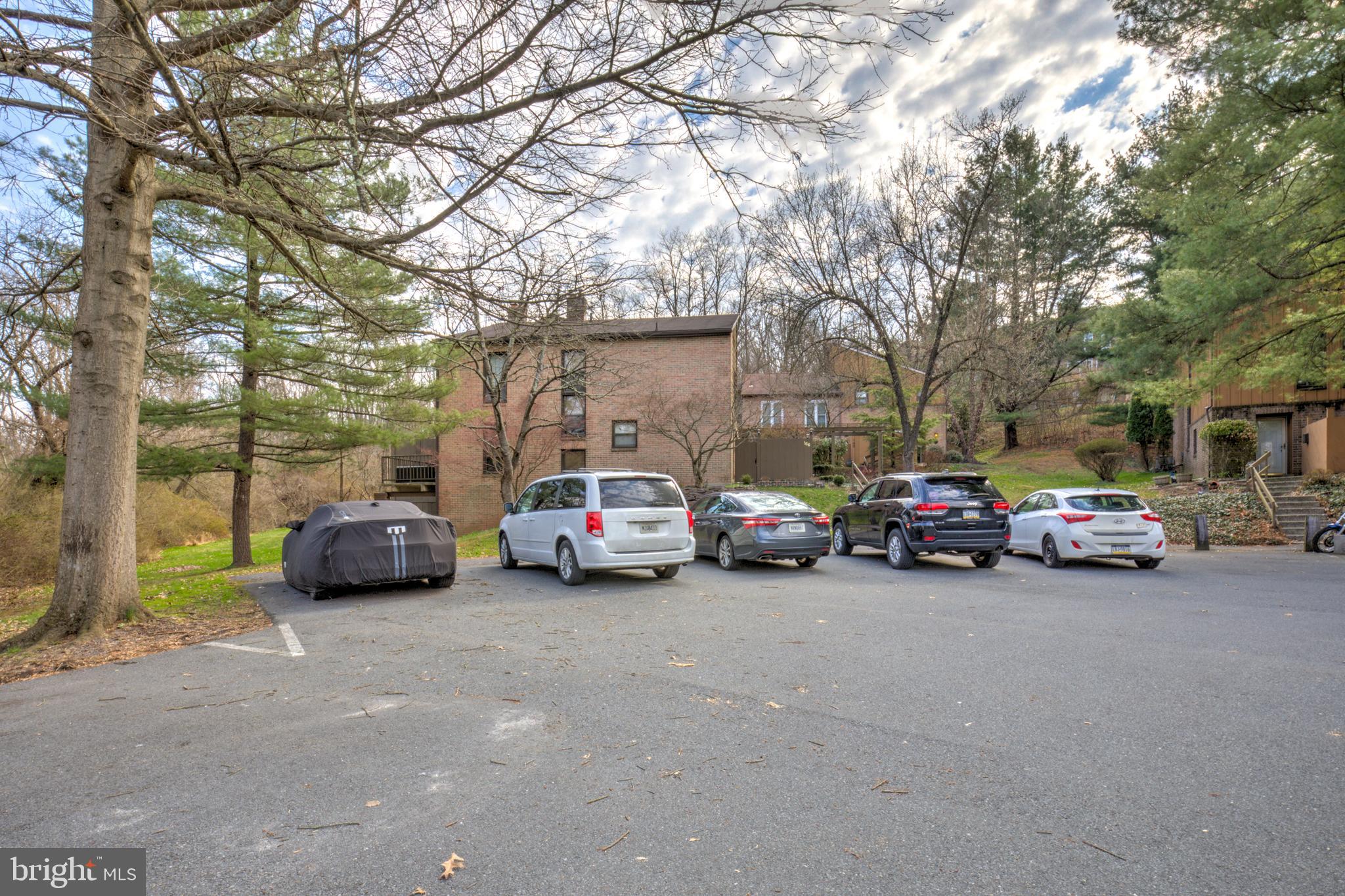 165 Oakmont Court Reading, PA 19607 - Photo 40 of 40 a view of a cars parked in front of a house