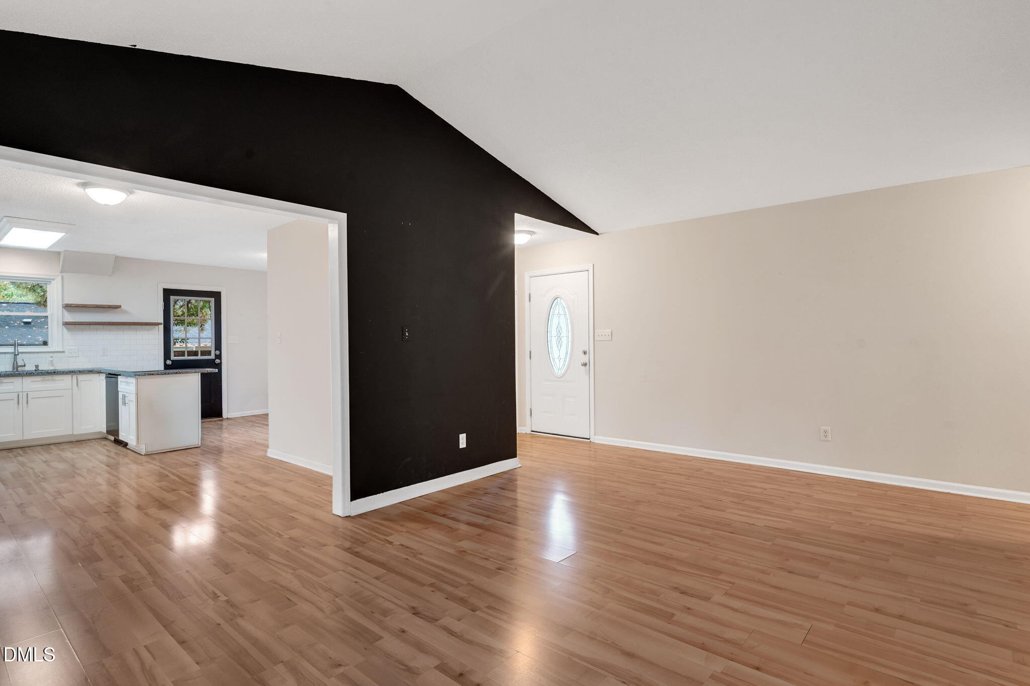 102 Castill Place Garner, NC 27529 - Photo 12 of 37 a view of a livingroom with wooden floor
