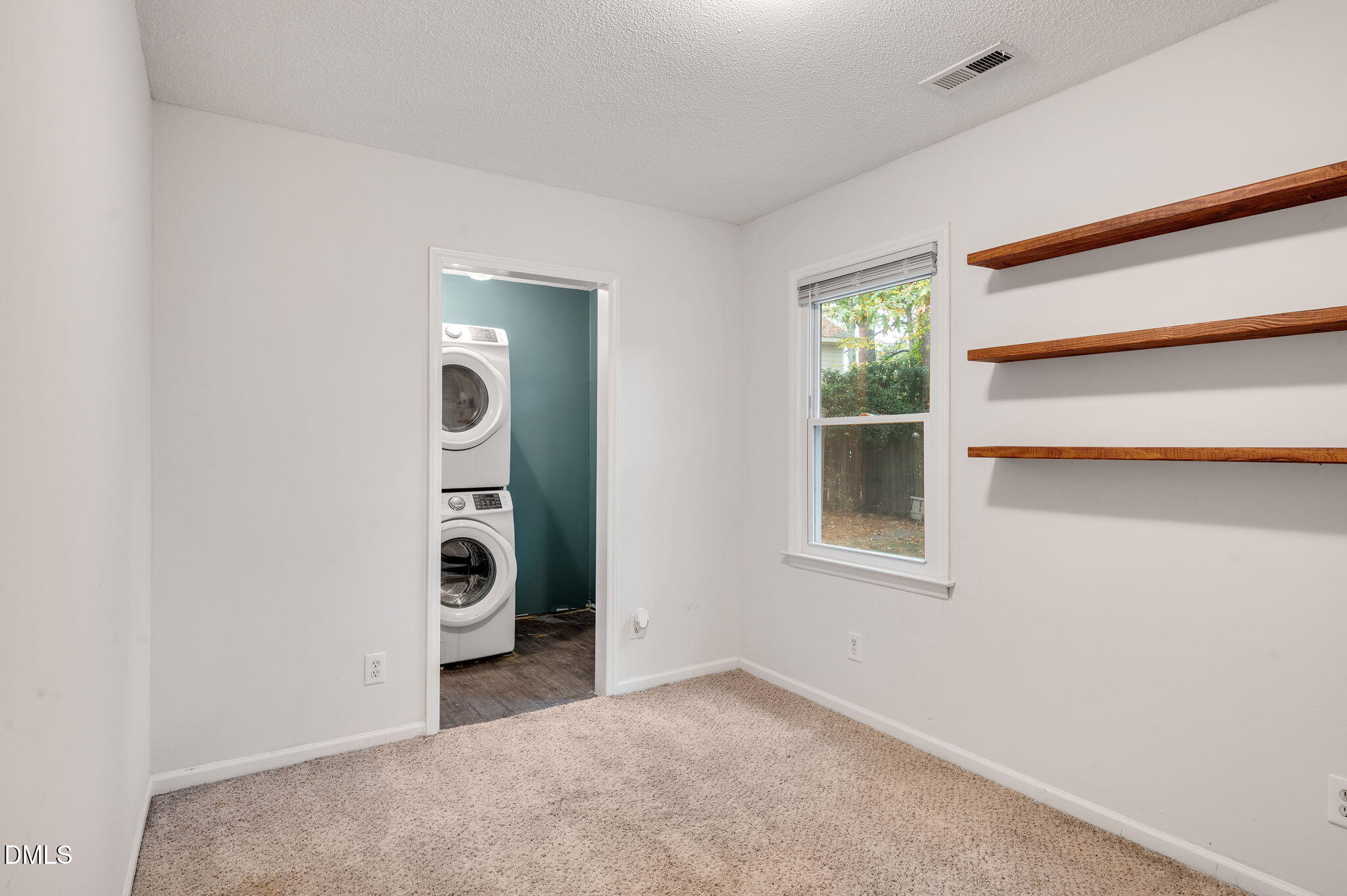 102 Castill Place Garner, NC 27529 - Photo 16 of 37 an empty room with windows and closet