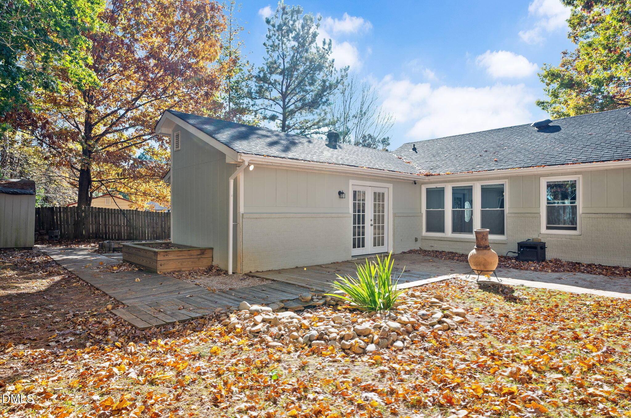 102 Castill Place Garner, NC 27529 - Photo 35 of 37 a front view of a house with garden