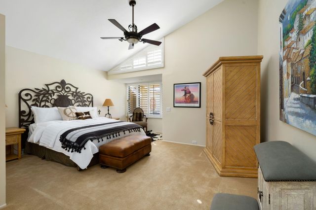 a bathroom with a double vanity sink and mirror
