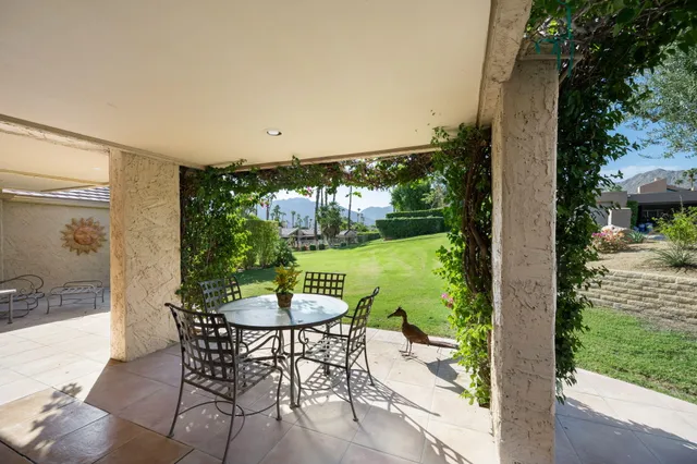 a view of a garden with a lake view