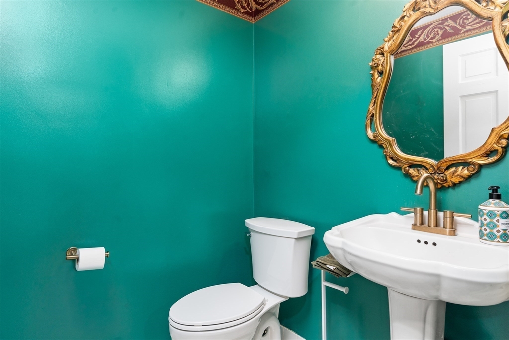 7 Saddle Ridge Road Sudbury, MA 01776 - Photo 24 of 42 a bathroom with a toilet and a sink