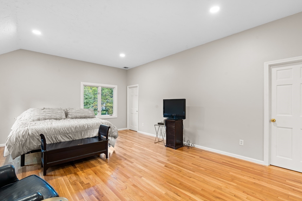 7 Saddle Ridge Road Sudbury, MA 01776 - Photo 29 of 42 a bed room with a bed and a tv