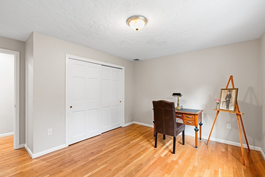 7 Saddle Ridge Road Sudbury, MA 01776 - Photo 31 of 42 a workspace room with furniture and wooden floor
