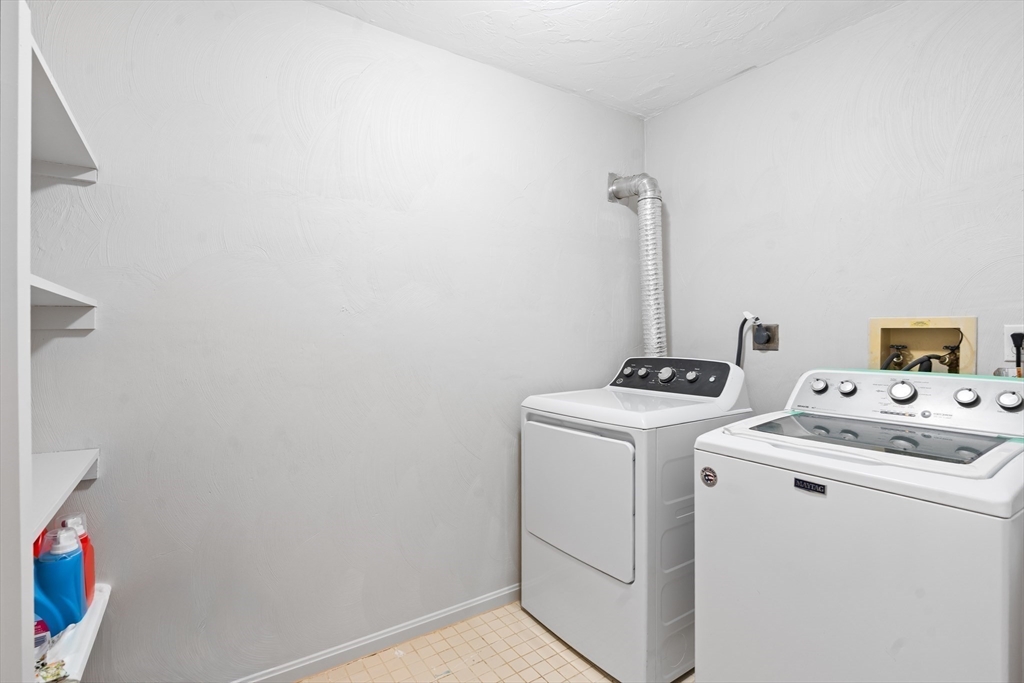 7 Saddle Ridge Road Sudbury, MA 01776 - Photo 33 of 42 a view of storage and utility room with washer and dryer