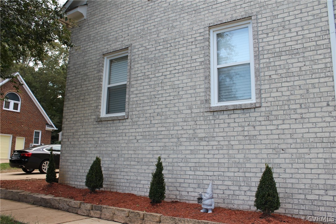13006 Chipstead Road Chester, VA 23831 - Photo 43 of 45 a brick house with four windows
