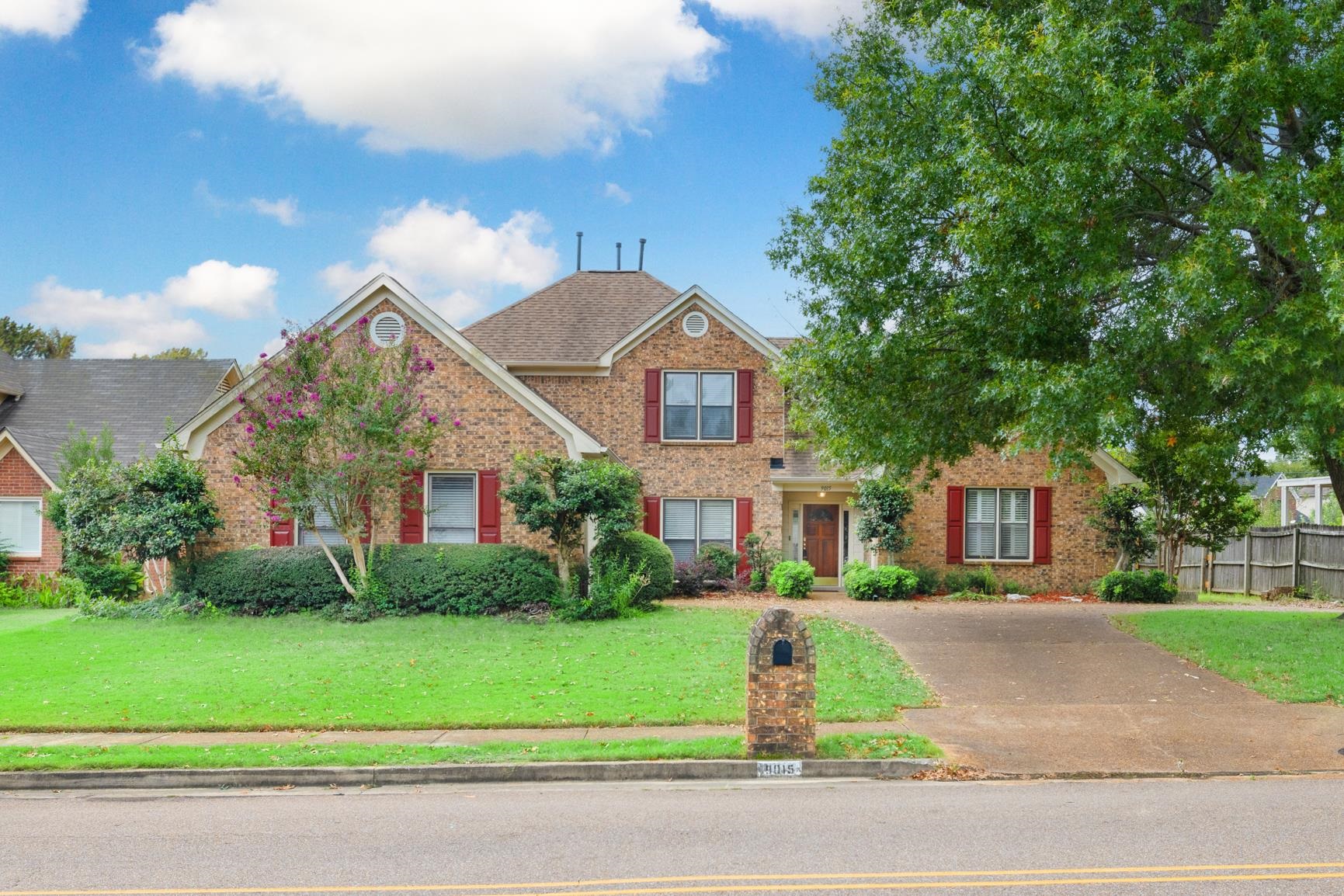 9015 Raspberry Lane Cordova, TN 38016 - Photo 2 of 40 View of front of property with a front yard