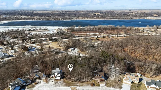 a aerial view of a house with a yard