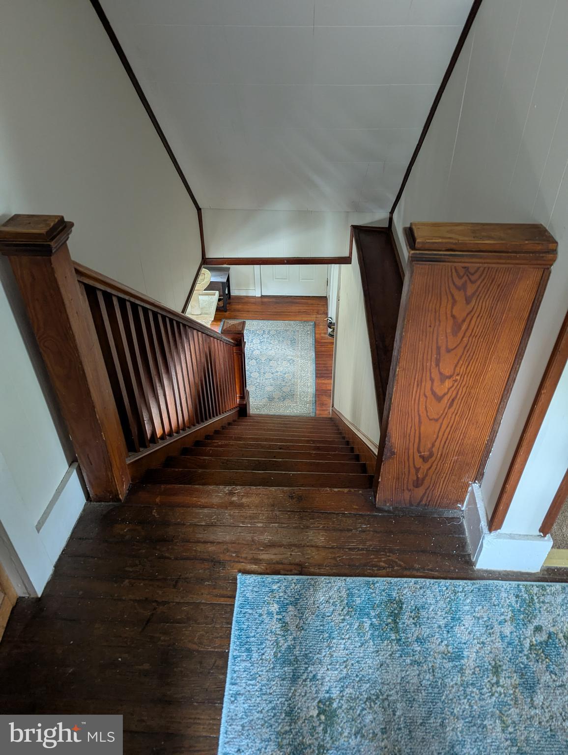 2812 Hossler Road Manheim, PA 17545 - Photo 23 of 45 a view of staircase with wooden floor and chair