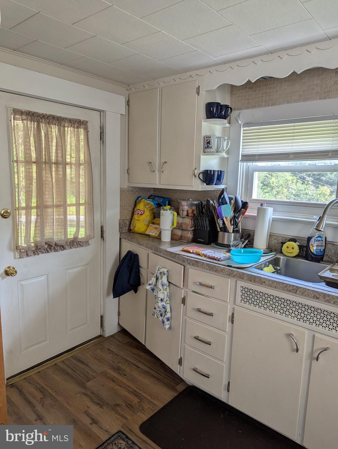 2812 Hossler Road Manheim, PA 17545 - Photo 9 of 45 a kitchen with a cabinets a sink and a window