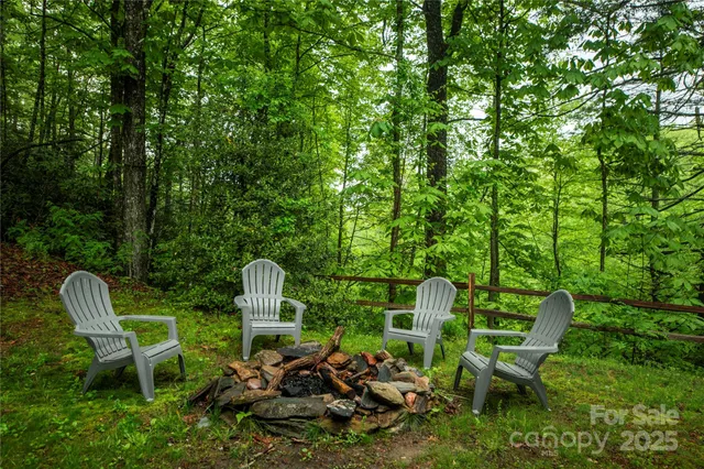 a front view of a house with garden and patio