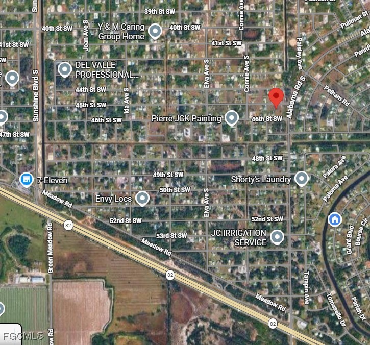 2503 45th Street Southwest Lehigh Acres, FL 33976 - Photo 3 of 7 a city view from a balcony