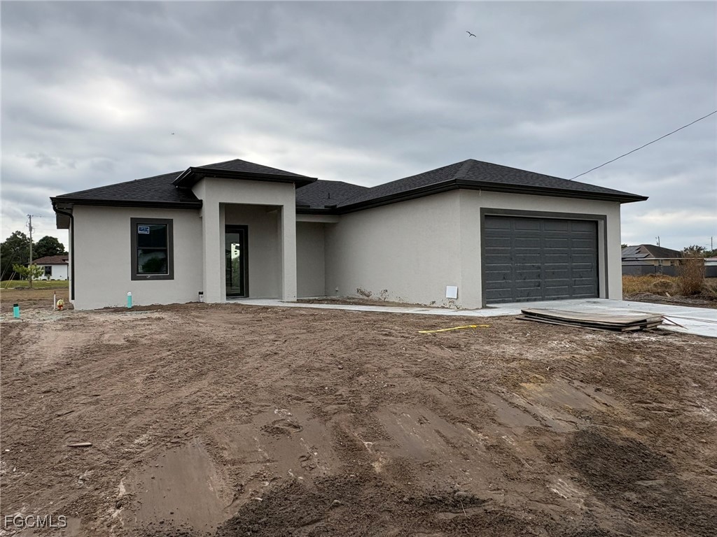 2503 45th Street Southwest Lehigh Acres, FL 33976 - Photo 4 of 7 a house with a outdoor space