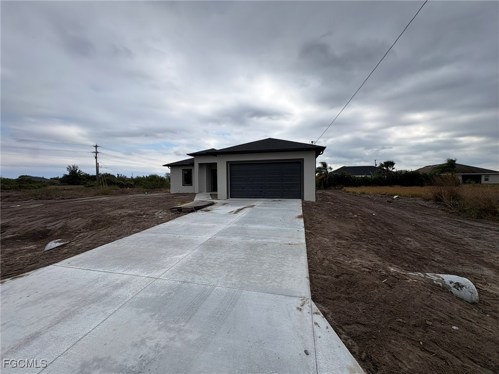 2503 45th Street Southwest Lehigh Acres, FL 33976 - Photo 6 of 7 a view of a house with backyard