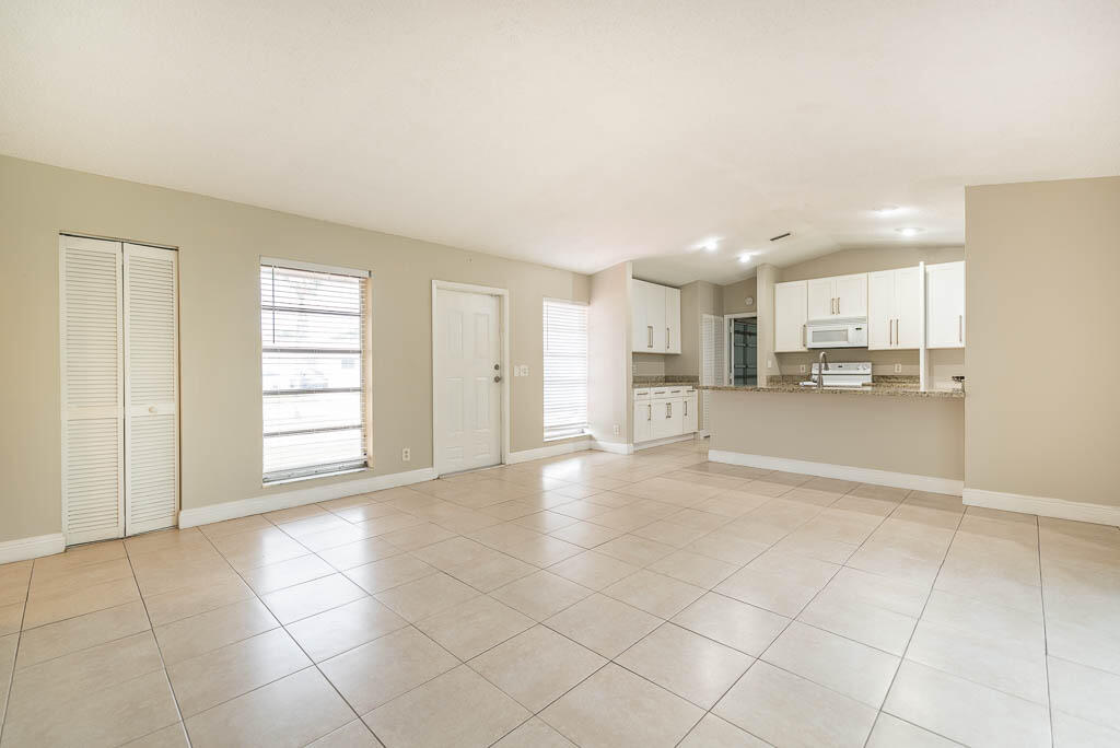 10225 Sleepy Brook Way Boca Raton, FL 33428 - Photo 29 of 41 a view of a kitchen with a sink and a window