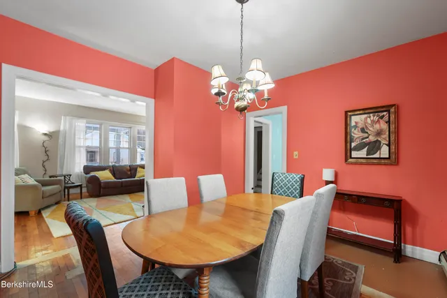 a view of a dining room with furniture