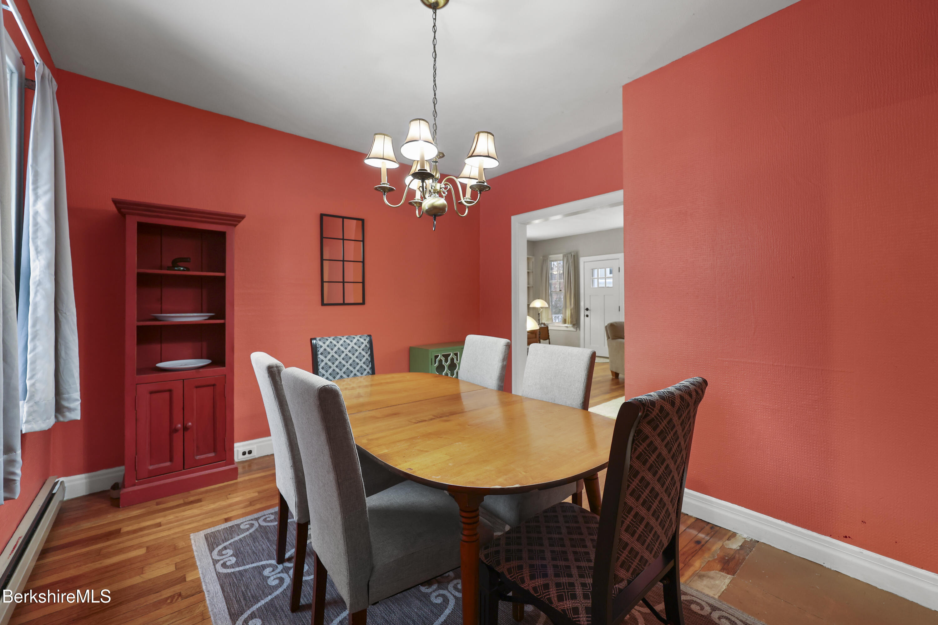 64 Notch Road North Adams, MA 01247 - Photo 13 of 37 a view of a dining room with furniture window and wooden floor