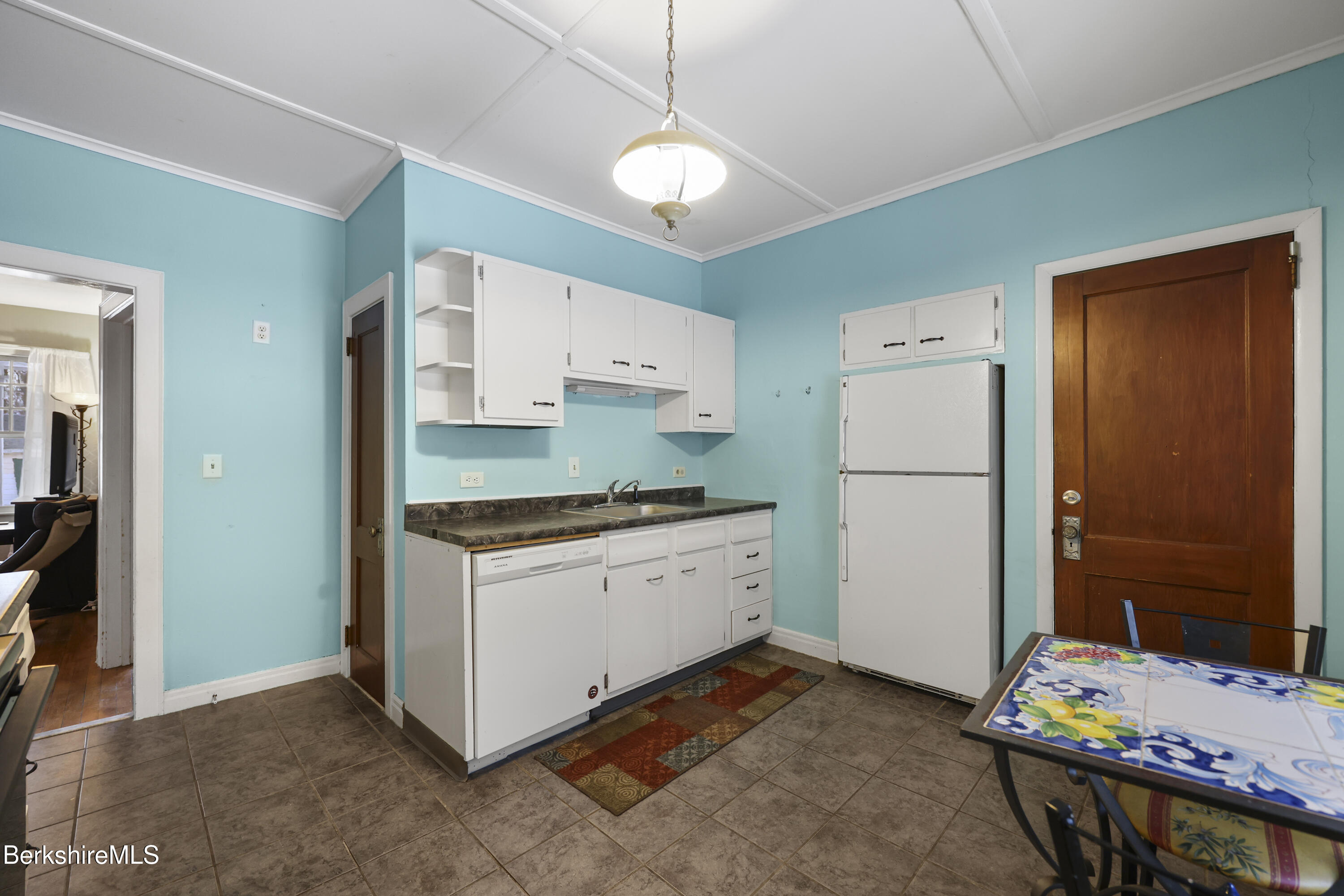 64 Notch Road North Adams, MA 01247 - Photo 15 of 37 a kitchen with a refrigerator a stove top oven a sink and dishwasher