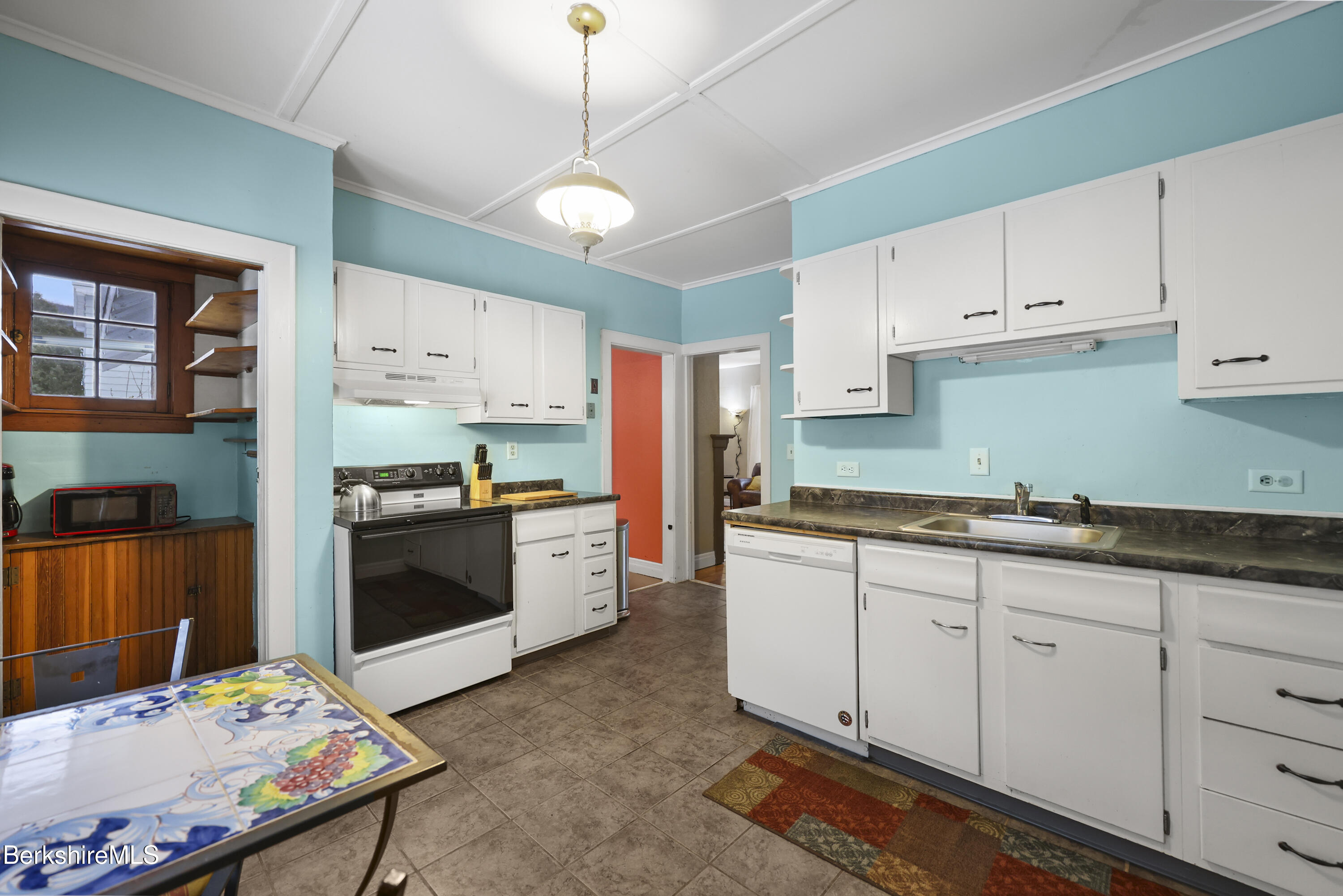 64 Notch Road North Adams, MA 01247 - Photo 16 of 37 a kitchen with granite countertop a sink stove and refrigerator