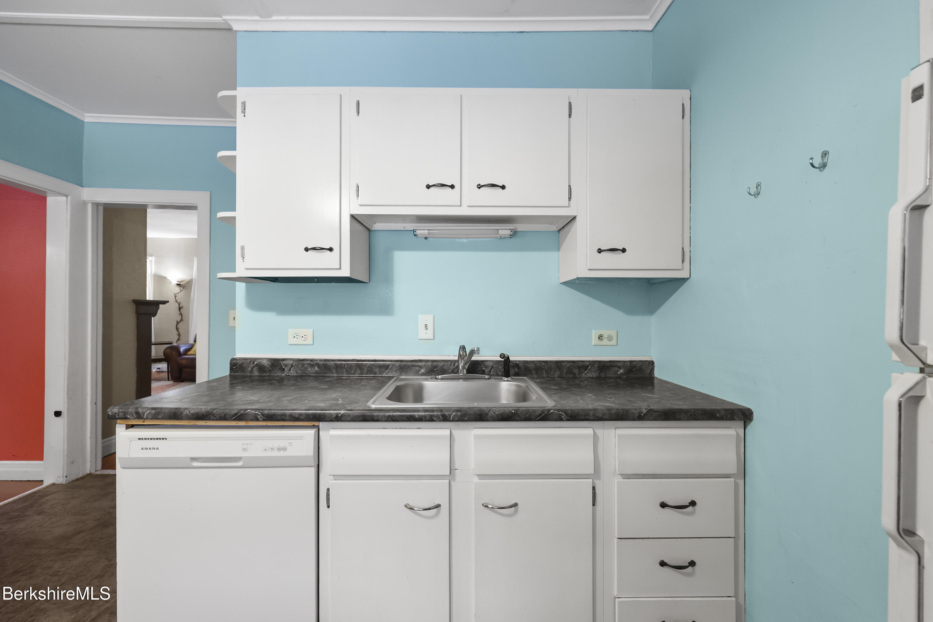 64 Notch Road North Adams, MA 01247 - Photo 18 of 37 a sink with cabinets and wooden floor