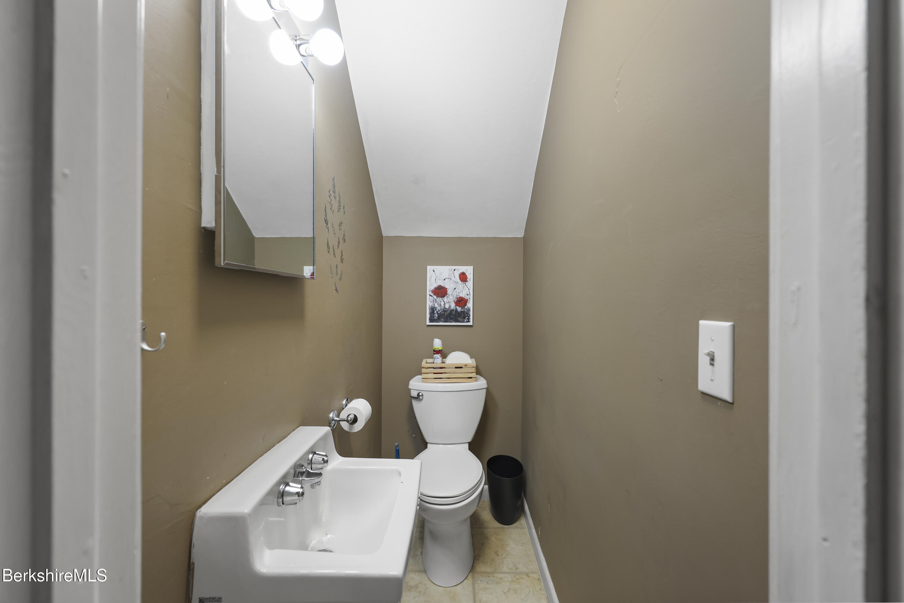 64 Notch Road North Adams, MA 01247 - Photo 20 of 37 a bathroom with a toilet sink and mirror
