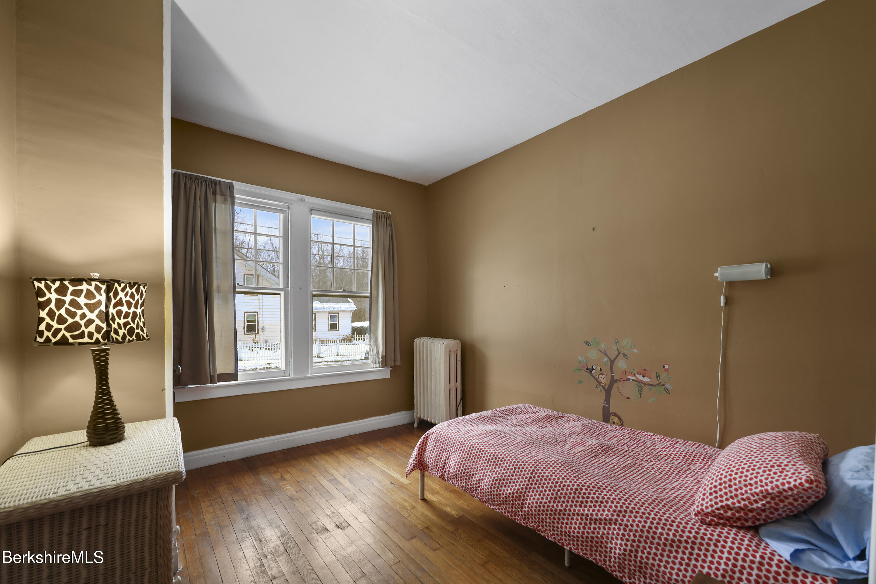 64 Notch Road North Adams, MA 01247 - Photo 22 of 37 a bedroom with a bed and wooden floor