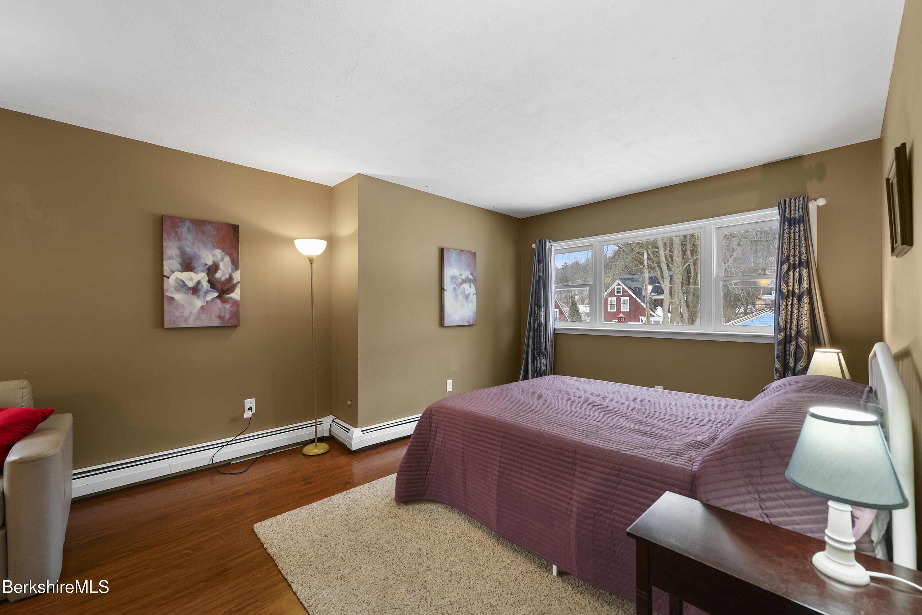 64 Notch Road North Adams, MA 01247 - Photo 27 of 37 a bedroom with a bed and wooden floor