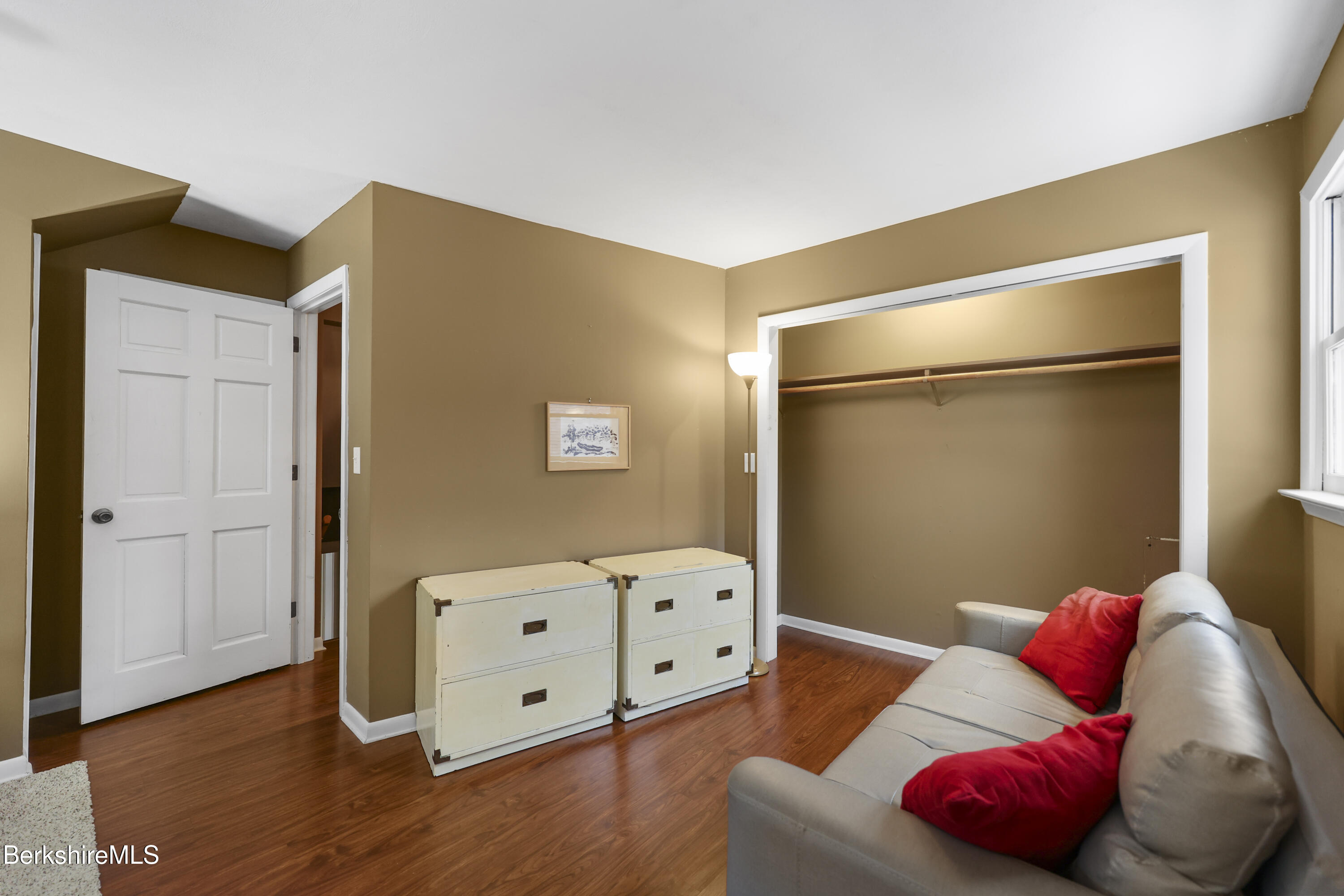 64 Notch Road North Adams, MA 01247 - Photo 29 of 37 a bedroom with a bed and wooden floor