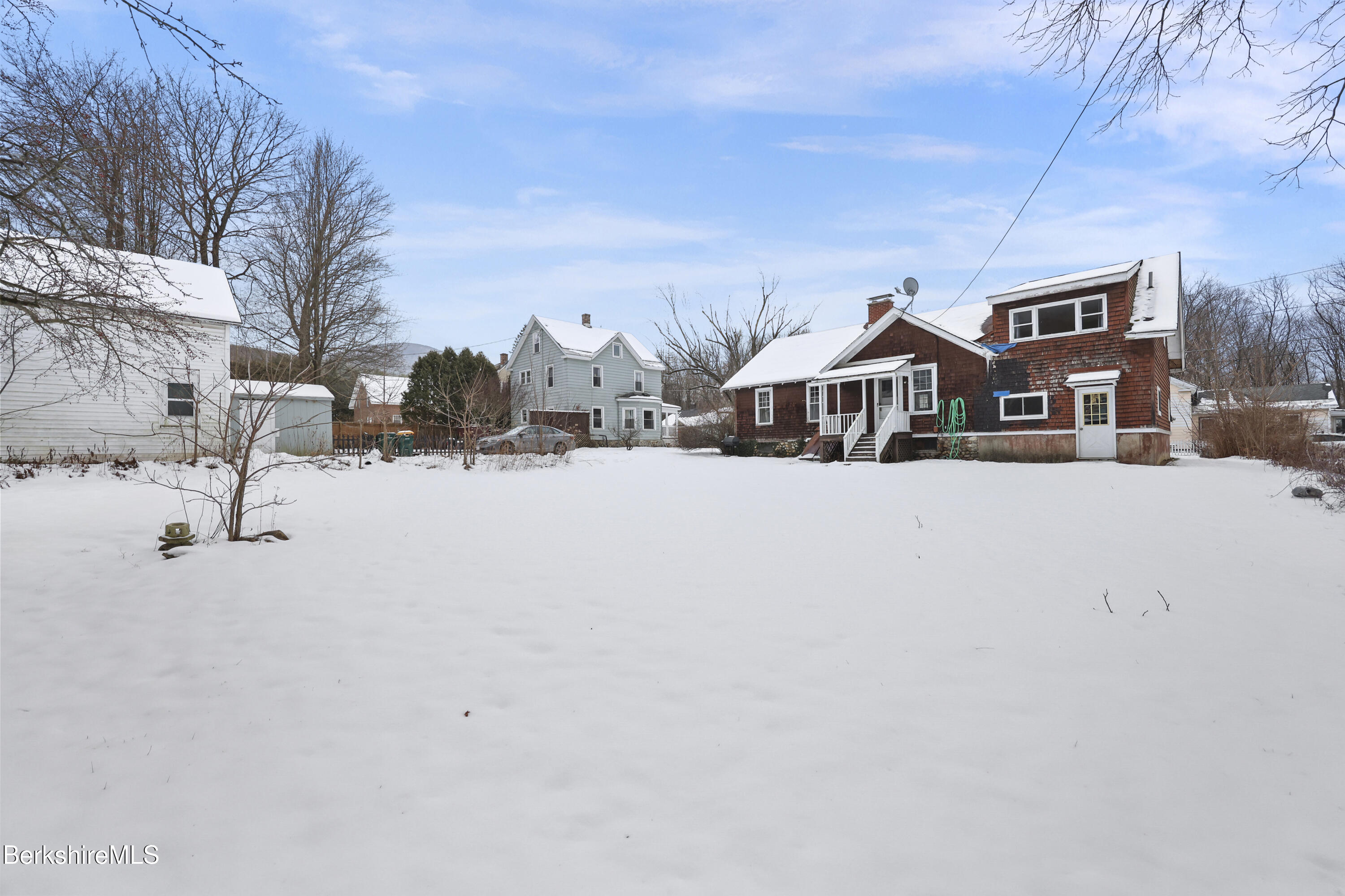 64 Notch Road North Adams, MA 01247 - Photo 35 of 37 a front view of a house with a yard covered in snow