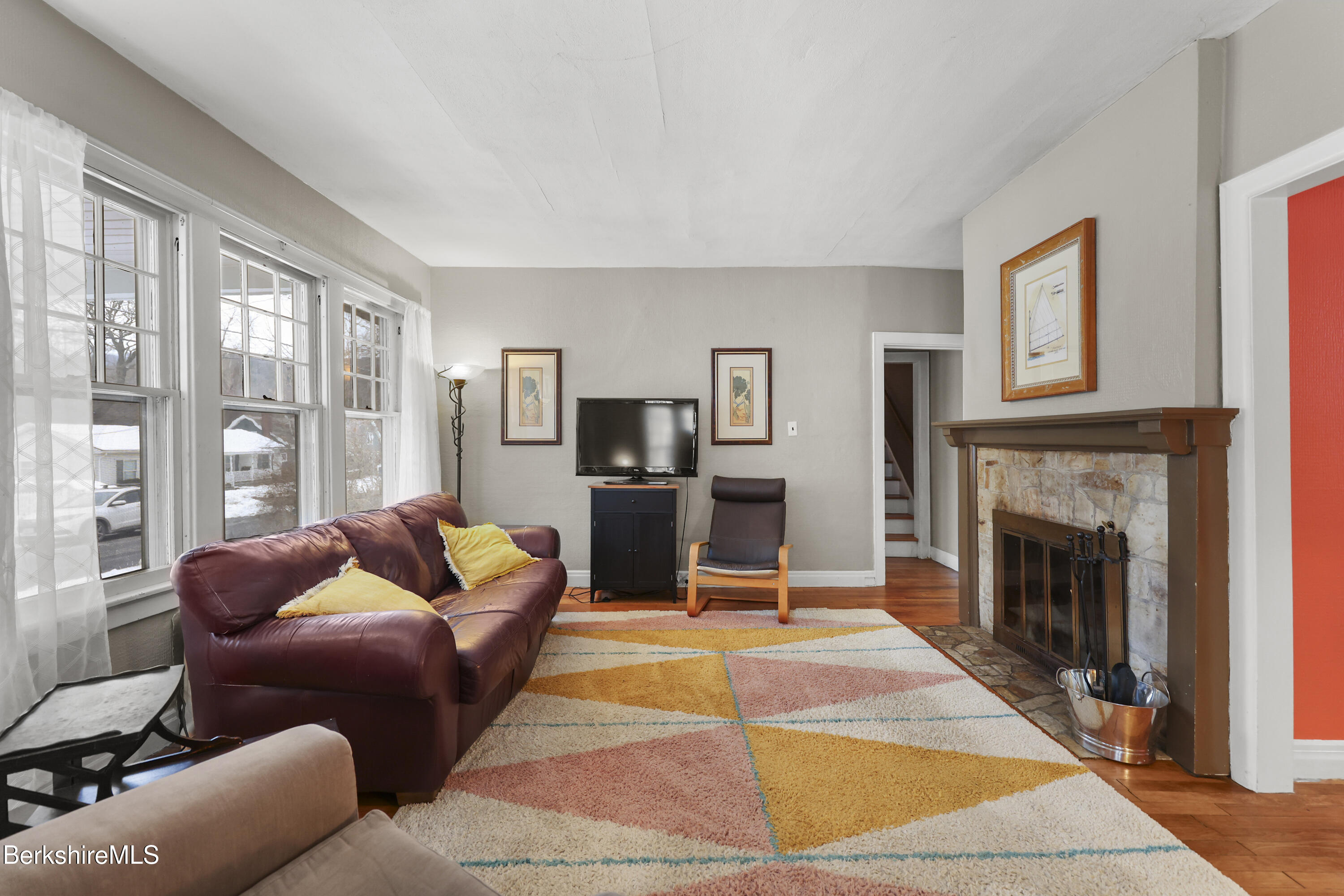 64 Notch Road North Adams, MA 01247 - Photo 5 of 37 a living room with furniture and a fireplace